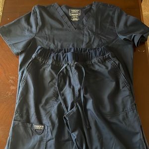 Cherokee authentic work wear scrubs. Navy blue Top and pants complete set.